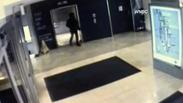Newly released surveillance video shows and armed Richard Shoop walking calming through a mall in New Jersey before taking his own life. (Source: WNBC/CNN)