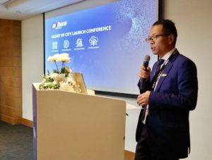 Mr. Xin Chen Giving a Welcome Speech